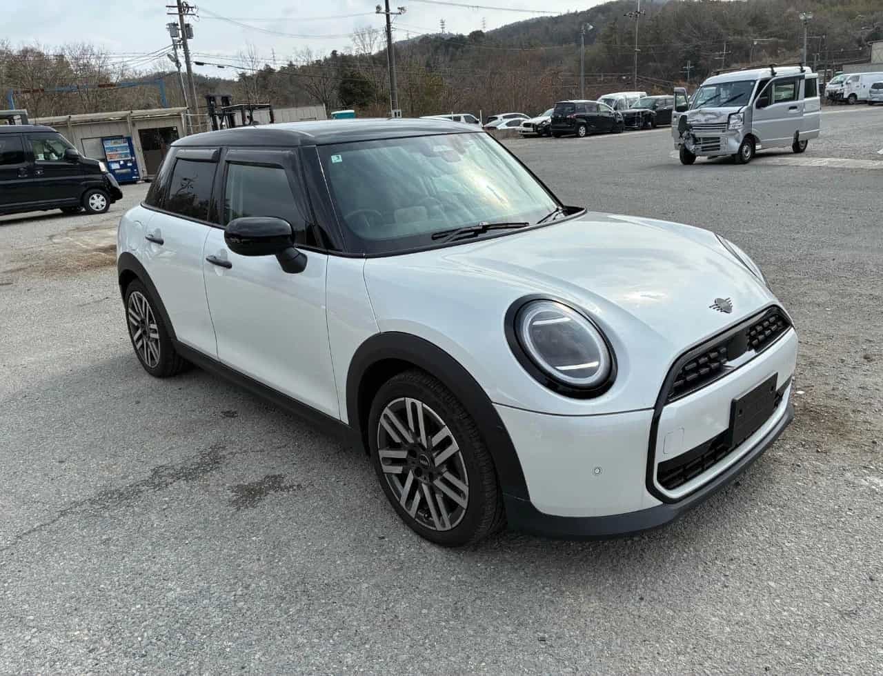 Red sports car on mountain road