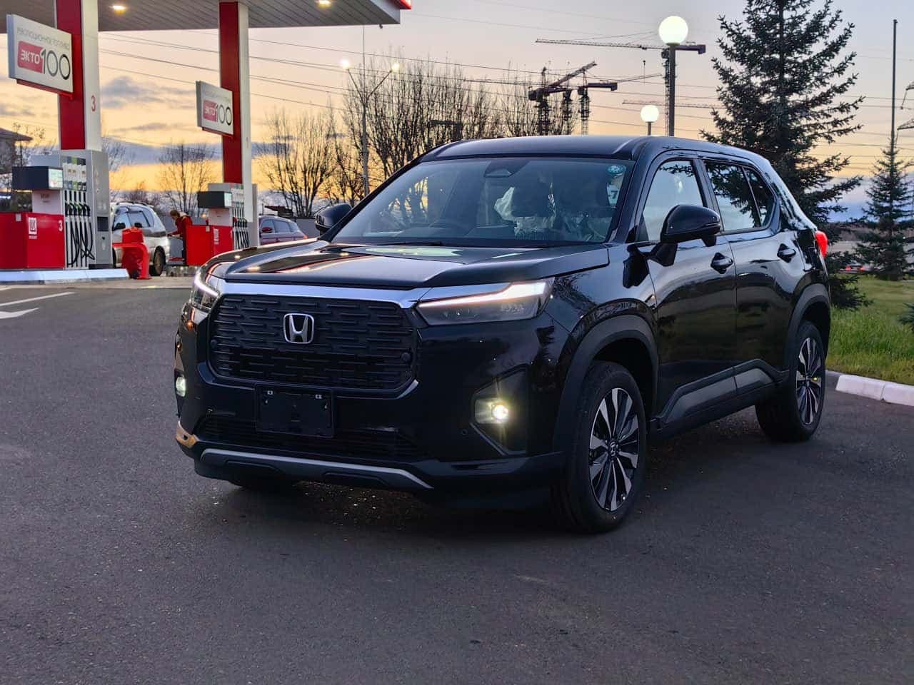 Luxury sedan in urban night setting