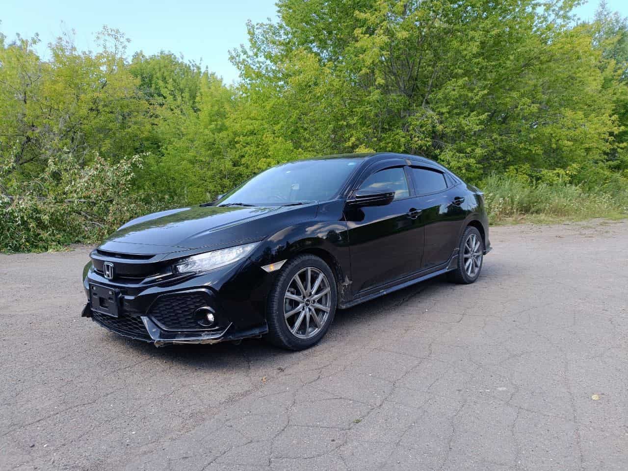 Car wheel and brake caliper detail